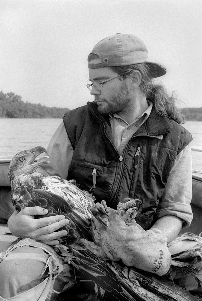 Craig Thompson & immature bald eagle K68